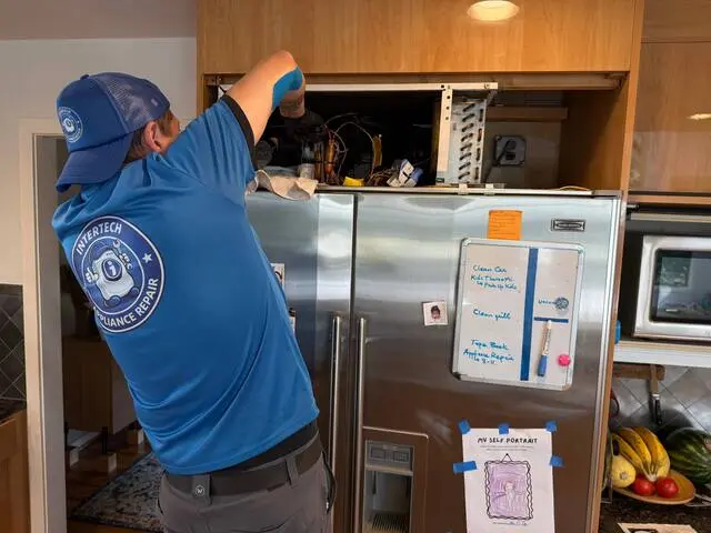 Sub-Zero Appliance Repair – InterTech Gallery photo of InterTech servicing Sub-Zero appliances