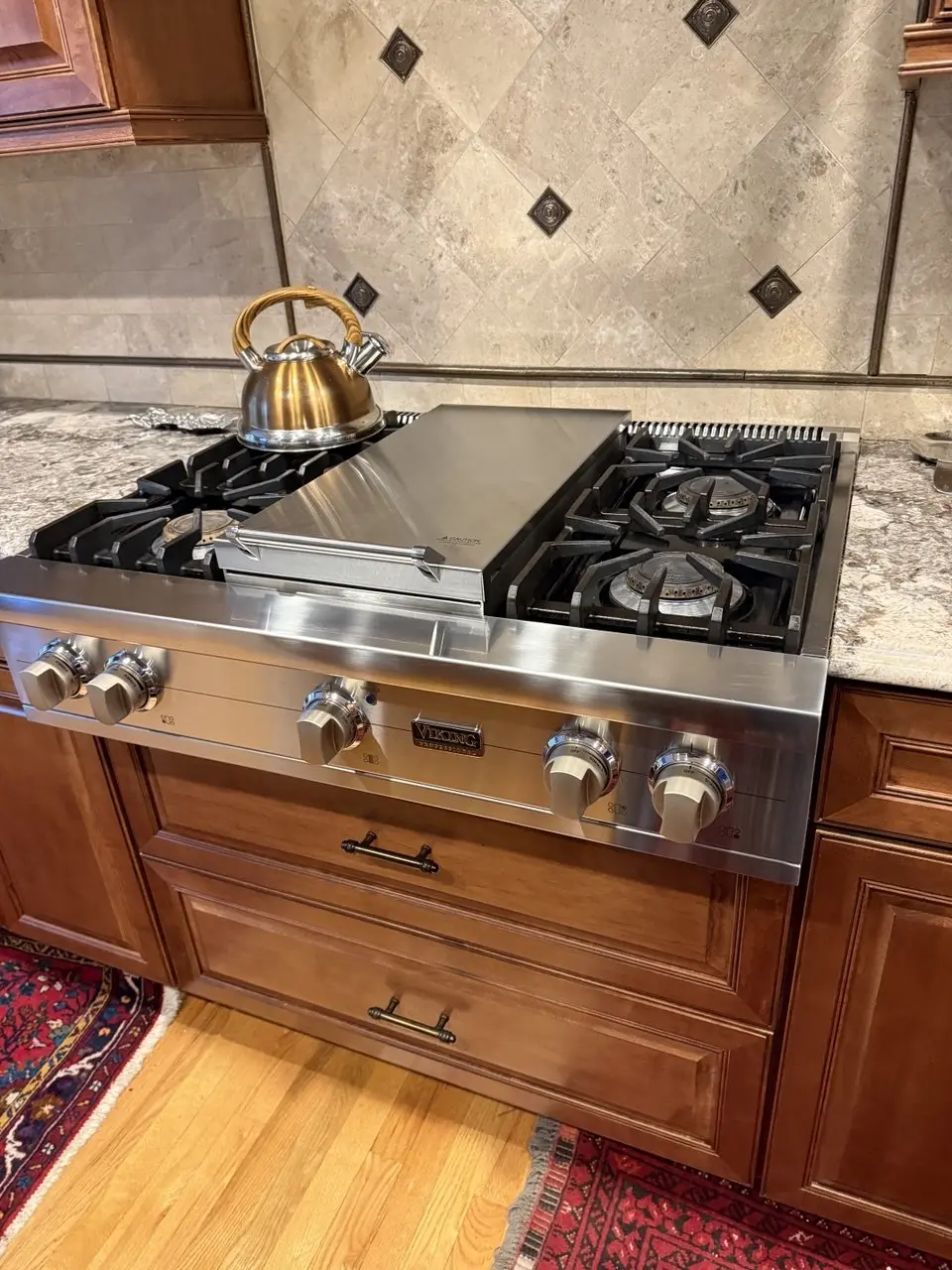 InterTech service gallery featuring Viking kitchen appliance repairs